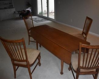 Four Haverty's dining chairs with cushions