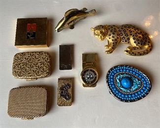 Tiger Belt Buckle 
Blue Stones Belt Buckle 
3 Money Clips ( 1 is Coach )
3 Vintage Compacts