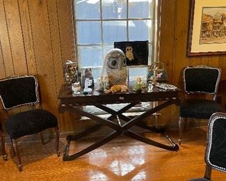 Pair of black consoles 
8 French chairs with black upholstery 
Owl collection 