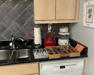 There are 3 kitchens in this house so many duplicates of appliances , silverware and dishes