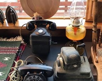 Rotary dial & crank party line phones,  oil lamp, check writing machine