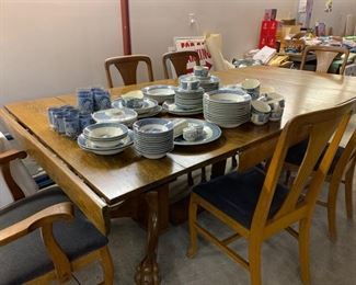 Large oak Antique Dining set and Large Currier and Ives Dish set