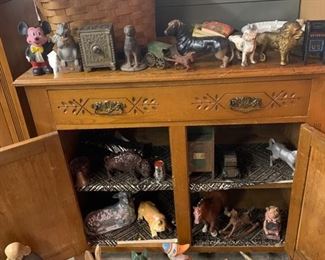 Bottom half ,and many cast iron door stops and banks