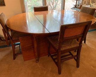 Old Table and Four Chairs