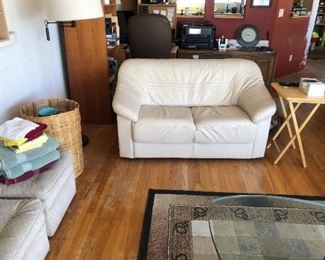 White faux leather love seat