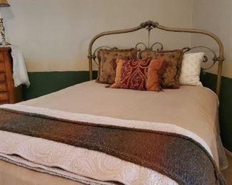 You have to see this bed it's beautiful.  The mattress is a queen and pillow top