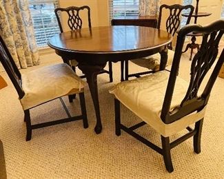 14_____ $595
Queen Ann style Ethan Allen round table with 2 leaves
Chippendale set of 4 chairs + 2 arms
chair  • 37"T x 21 1/2"W x 17 1/2"D x 18"H
Arm  • 37"T x 23"W x 19"D x arm to arm 20"
Table  • 29 1/2" x 44"D  + 2 leaves 18" x 2