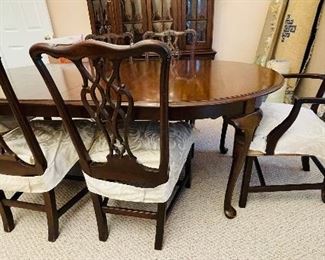 14_____ $595
Queen Ann style Ethan Allen round table with 2 leaves
Chippendale set of 4 chairs + 2 arms
chair  • 37"T x 21 1/2"W x 17 1/2"D x 18"H
Arm  • 37"T x 23"W x 19"D x arm to arm 20"
Table  • 29 1/2" x 44"D  + 2 leaves 18" x 2