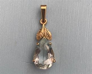 #32 - $75 Blue topaz pear shaped pendant on 14kt yellow gold mount