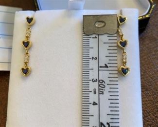 $275 - 18kt gold dangling earrings diamonds and saphires. 