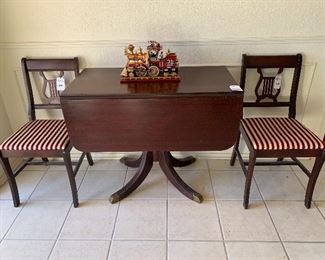Petite drop leaf vintage table with 4 chairs