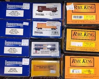 O scale model train cars including Rail King and Industrial brands
