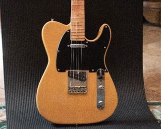 One of a kind Telecaster Rose Star, There is no other one. Beautiful neck w/Abilone inlays. Has played at many shows.
