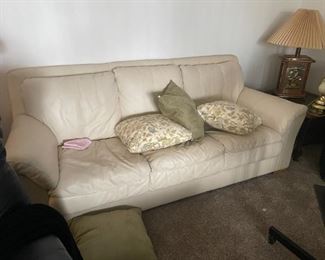 . . . a white leather couch -- notice nice table lamps