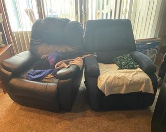 . . . two more recliners -- one black leather, the other upholstered