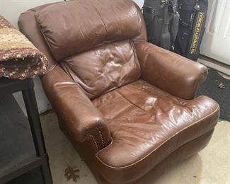 . . . a brown leather accent chair