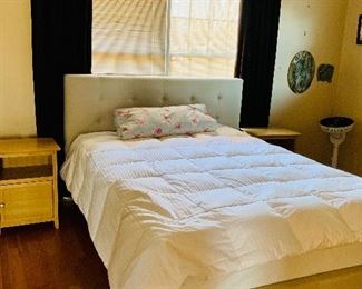 Tufted Queen size platform bed with Tempupedic mattress.