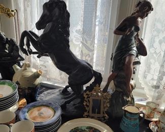 Horse statue is 24" high. Female figure is 24" high.