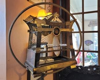 Birdcage in stand is 71" high