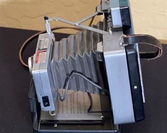 Polaroid Automatic 100 Land Camera 2.5x8x5in HxWxD