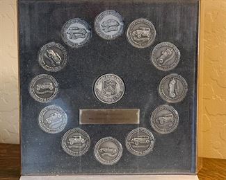 1920-30s Chrysler Plymouth Millionaires Club Coin Collection	9 x 9 x 3in	HxWxD

