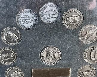 1920-30s Chrysler Plymouth Millionaires Club Coin Collection	9 x 9 x 3in	HxWxD
