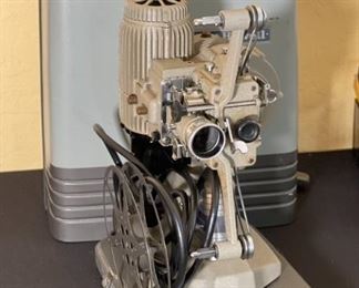 Bell & Howell 16mm Film Projector 273 Model A	16x13x8.5in	HxWxD
