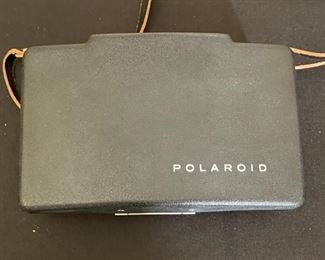 Polaroid Automatic 100 Land Camera	2.5x8x5in	HxWxD
