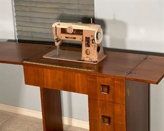 Singer 401A Sewing Machine in Console Cabinet	31 x 29 x 16.5in	HxWxD
