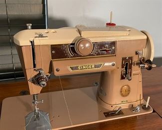 Singer 401A Sewing Machine in Console Cabinet	31 x 29 x 16.5in	HxWxD
