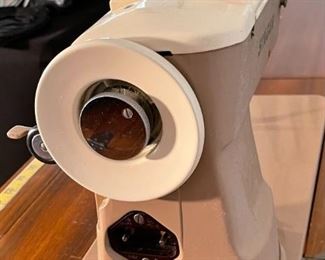 Singer 401A Sewing Machine in Console Cabinet	31 x 29 x 16.5in	HxWxD
