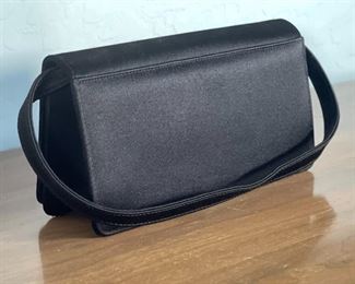 Stuart Weitzman  Black Satin Purse Handbag	4.5x8.75x3in	HxWxD
