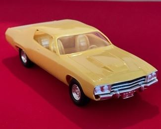 1974 Plymouth Roadrunner Blaze Yellow Model Dealer Promo Car	2.5x3.25x8	HxWxD
