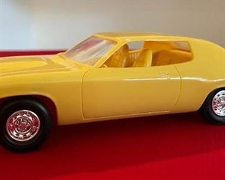 1974 Plymouth Roadrunner Blaze Yellow Model Dealer Promo Car	2.5x3.25x8	HxWxD
