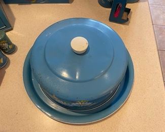 RANSBURG VINTAGE CAKE CADDY/CARRIER RARE BLUE WITH HAND PAINTED FLOWERS	6. 5 x 16“ diameter	
