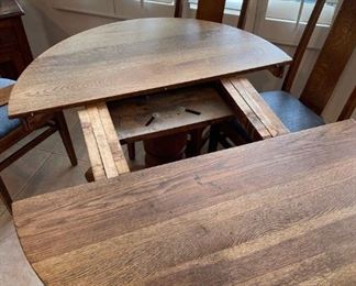 Old wooden oak round dining room table with 6 chairs	Table 30 inches high 41.5 inches in diameter chair seating height 20.5 inches chair with 17 inches	
