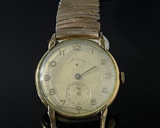 1949 Lord Elgin 14k Gold Fill Watch 556 21 Jewels Model 7 	Case: 33x32mm	
