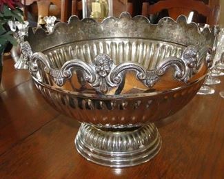 Silver plate bowl with faces