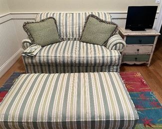 Loveseat sleeper with matching storage ottoman