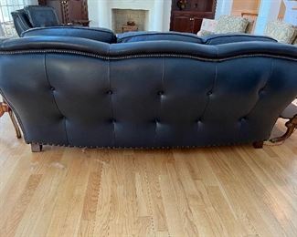 Beautiful button tufted leather sofa