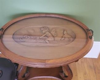 Carved coffee table under glass