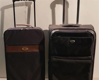 2 Black Soft Side Rolling Suitcases ~ Larger One: 16 x 10 x 24 in. tall