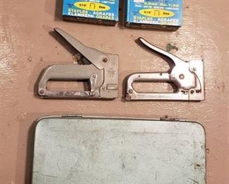 2 Staplers, 5 Boxes of Arrow Staples and Metal Box