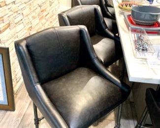 6 Ashley (2 not pictured) upholstered faux leather bar stools