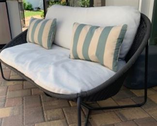 Morocco Graphite Oval Outdoor Loveseat with White Cushion from Crate and Barrel

