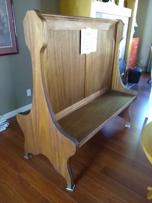 Antique mahogany railroad station bench from Menlo Park Depot.