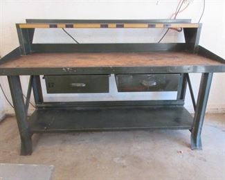 Surplus work bench with electricity and lockable drawers