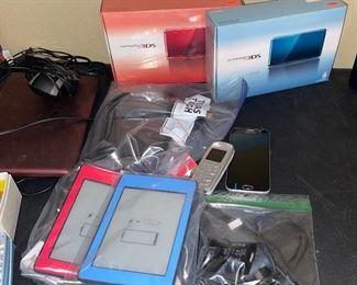 Two Nooks Red and Blue, Samsung Phone, Nintendo 3DS Red and Blue, Asus Laptop