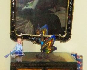 Chinese black lacquer cabinet with Chinese mirror.