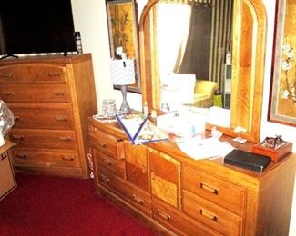 Chest of drawers and dress with bedroom set.